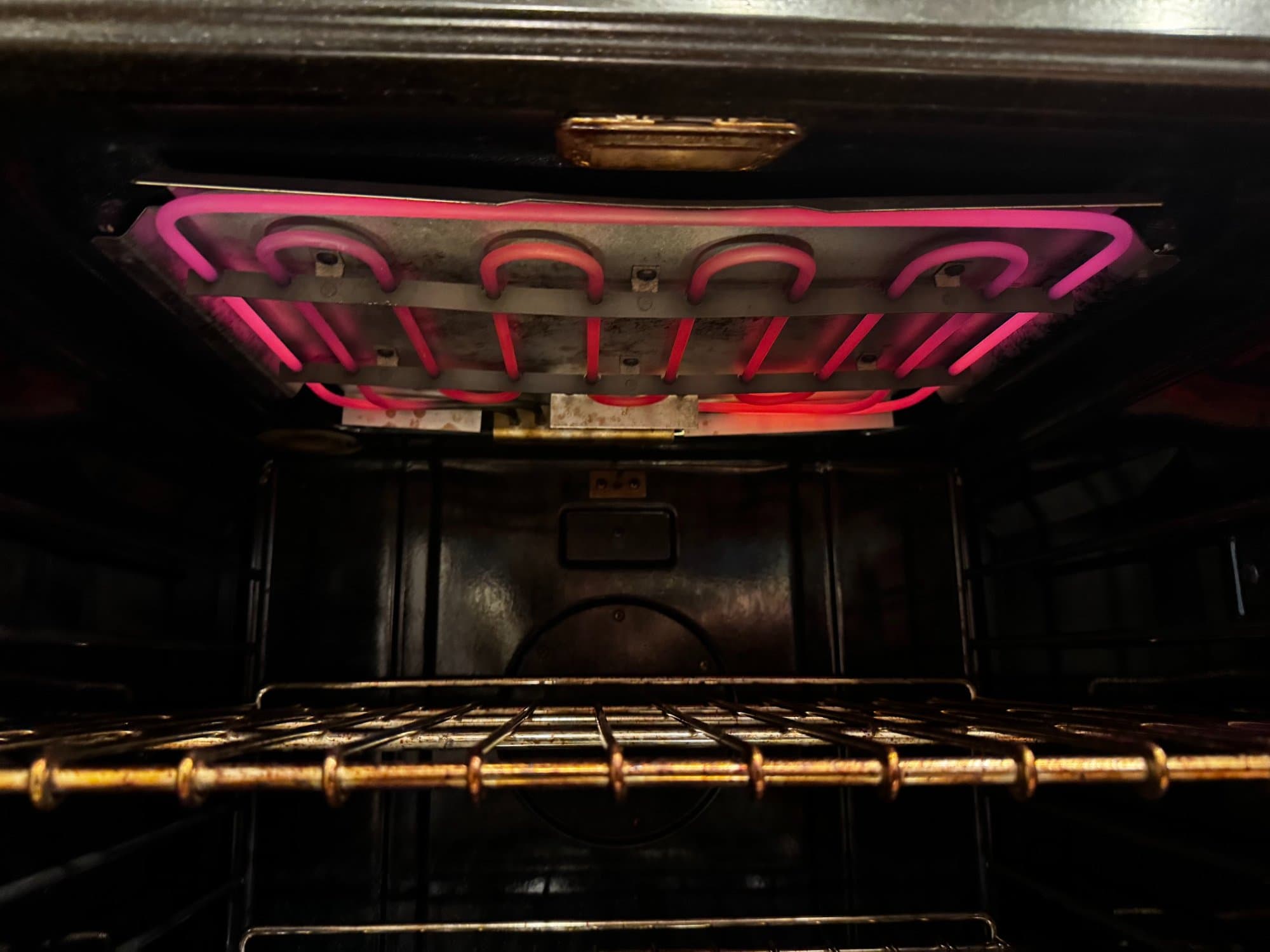 Oven broil element glowing red during heating test